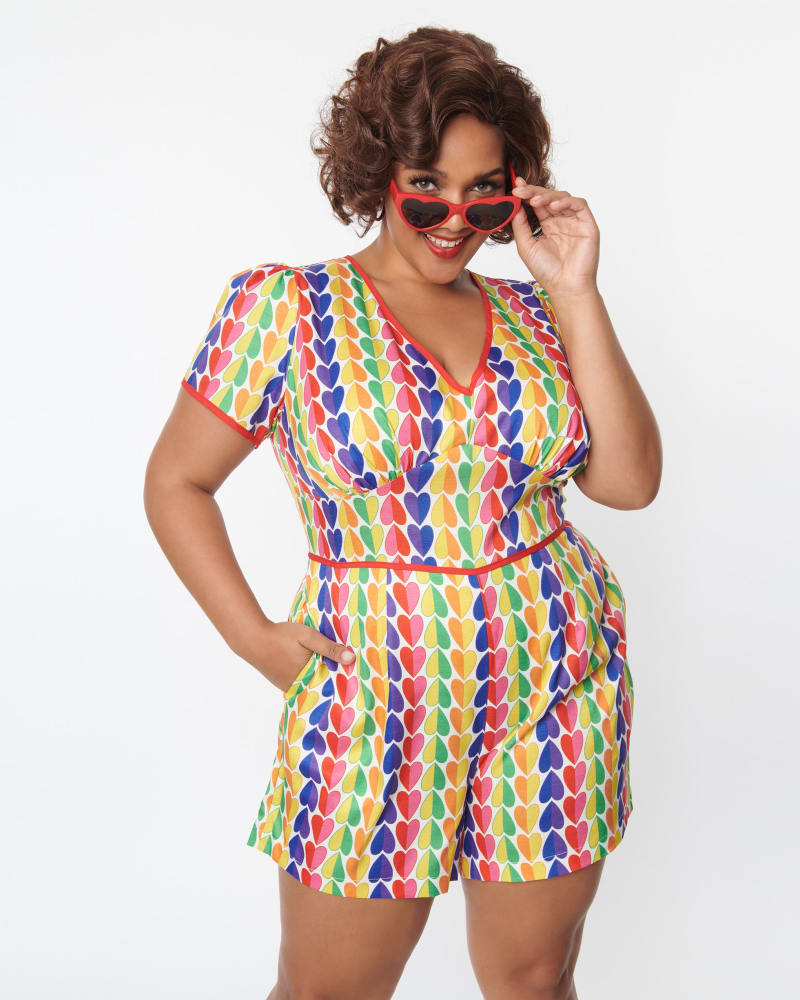 Front of a model wearing a size 3X Unique Vintage Rainbow Heart Romper in Rainbow by Unique Vintage. | dia_product_style_image_id:298420